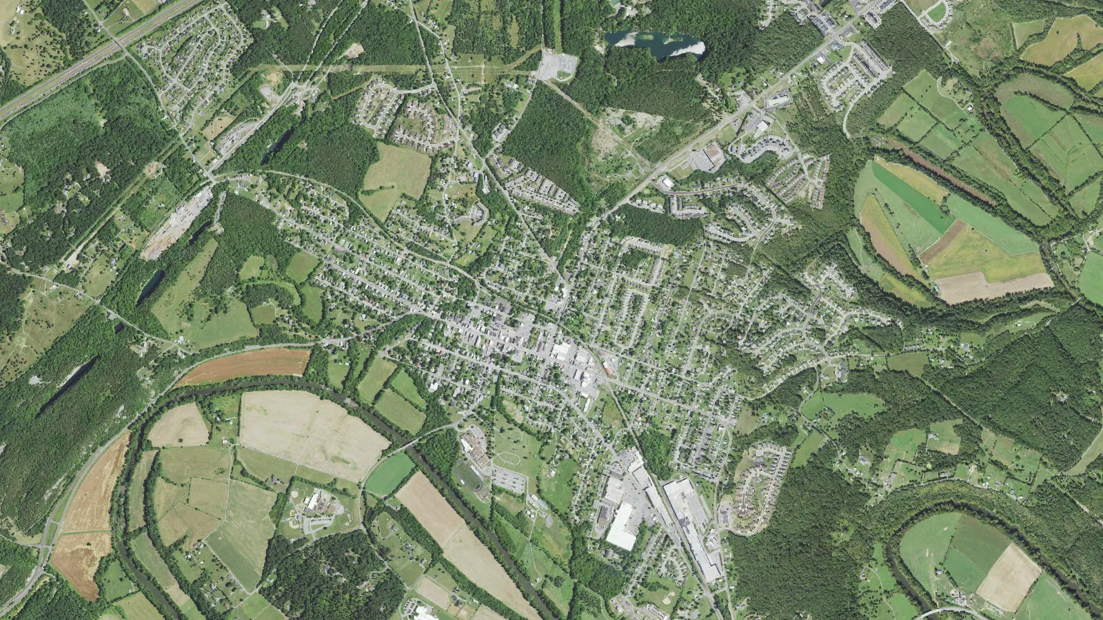 Aerial view of Strasburg, VA with farm fields along the North Fork of the Shenandoah River